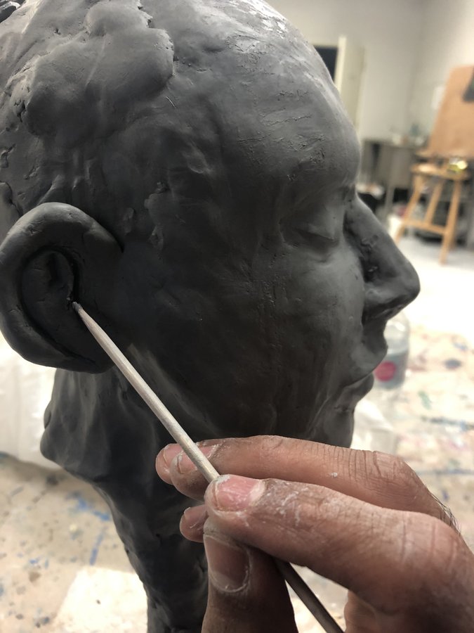 Bust study — clay portrait head in progress