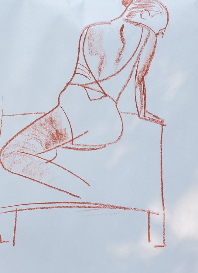 Figure drawing in sanguine — seated figure from behind