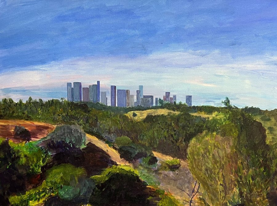 I Have to Go to Work — landscape of a city skyline seen across wooded hills